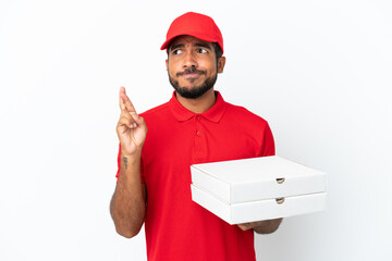 pizza delivery man picking up pizza boxes isolated on white background with fingers crossing and wishing the best