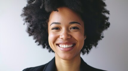 Happy, portrait and corporate woman with afro for a career, professional job or work headshot. Smile, business and face of a female employee looking elegant and isolated at white background