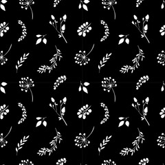 Seamless vector background with white flowers on a black background. Infinite seamless pattern of field flowers.