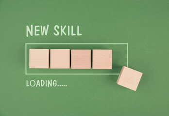 Progress bar with the words new skill loading, education concept, having a goal, online learning,...