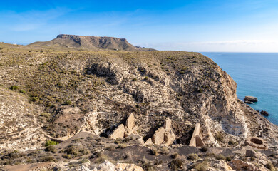 Ruins of old mineral loading dock near Agua Amarga village in Cabo de Gata, Spain