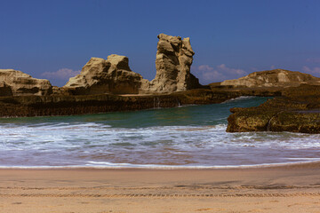 Beautiful beach with waves breaking on the rocks, Pacitan Klayer, East Java, Indonesia