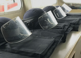 Bullet proof body armour and helmets