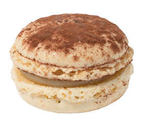 Yellow vanilla macaron sprinkled with cocoa isolated on background