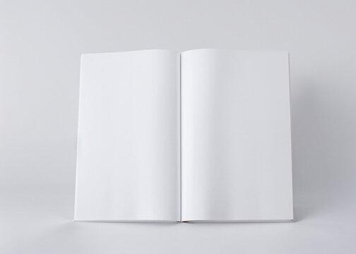 A white book with blank pages. 