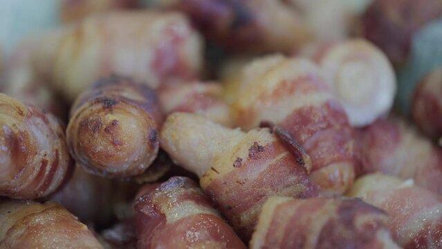 Close up of freshly cooked pigs in blankets