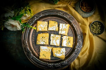  Popular Festival Sweets, Chickpeas and Coconut Chakki, Besan Moong Dal Burfi is made with yellow...