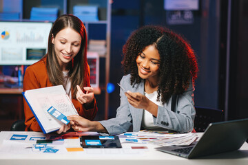  UX developer and ui designer brainstorming about mobile app interface wireframe design with...