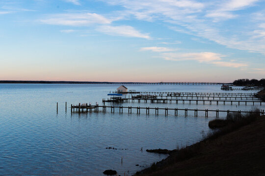 Golden hour view of dock on the Rappahannock River at Sunset - Powered by Adobe