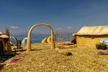 The Uros are an indigenous people who inhabit the floating islands on Lake Titicaca, which is located on the border between Peru and Bolivia. The Uros are known for their unique way of life - obrazy, fototapety, plakaty