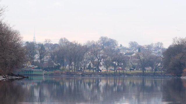 Lyndhurst New Jersey USA December 24: Looking at passing by car from city park, overcast weather city life theme