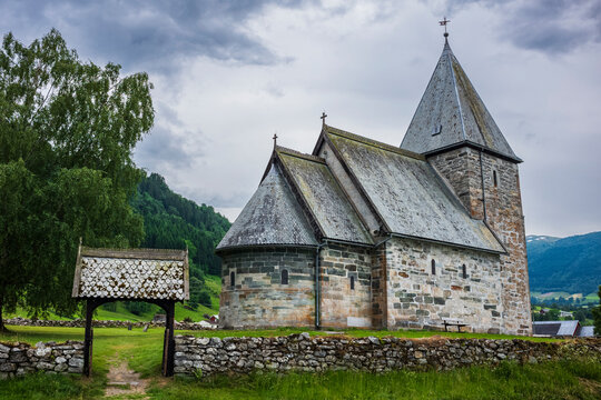 Hove church, an old stone church in Vikoyri, Norway, during a moody, dramtic day