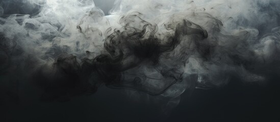 Dark smoke against a clear sky. - obrazy, fototapety, plakaty