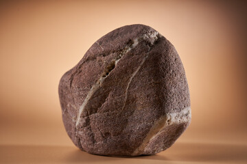 Closeup of a single large sandstone with insertions