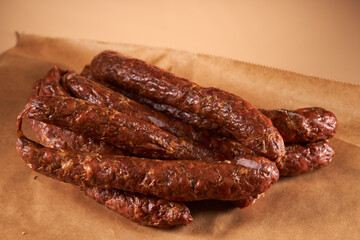 Pork sausages on cooking paper