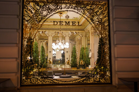Vienna, Austria - 11 December 2023: The shop window of the famous historic 1888 Demel elegant cafe and pastry shop in downtown Vienna before Christmas