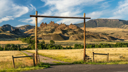 Buffalo Bill Cody Scenic Byway - ranch entrance and mountain views in Wapiti on the Cody Road to...