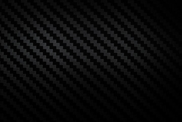 Carbon fiber composite raw material background. Carbon fiber texture. Dark Gray background with lighting. - obrazy, fototapety, plakaty