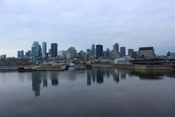 Montreal cityscape reflecting on St Lawrence River