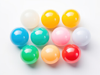 Small colored balls on a white background