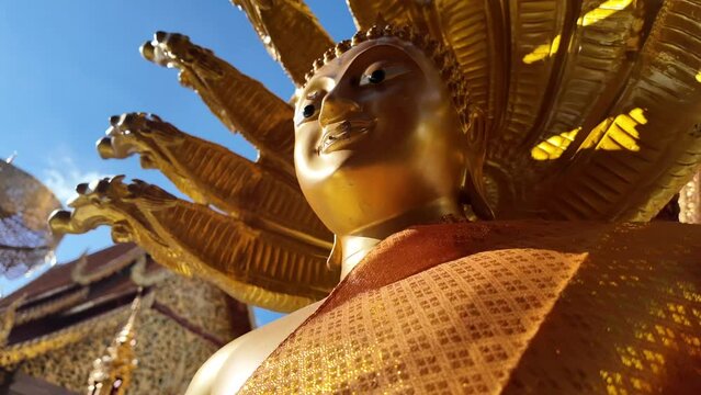 Amazing slow motion of a Buddhist guardian statue.	