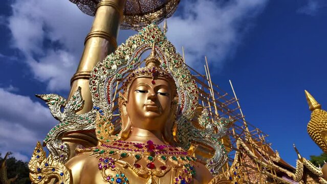Amazing slow motion of a Buddhist guardian statue.	