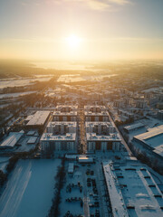 sunny winter over arctic town, sunset and snow at european city suburb residential district,...