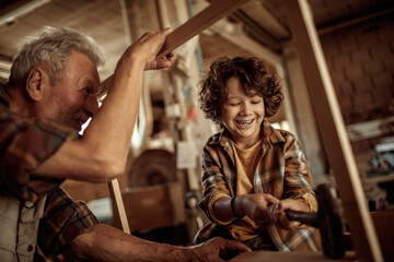Grandfather Teaching Woodworking to His Grandson