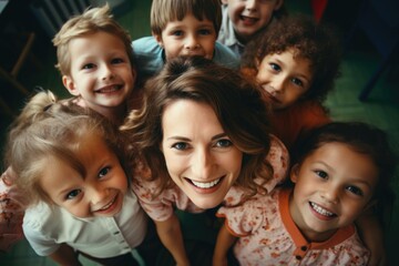 Portrait of a adult female teacher with child students