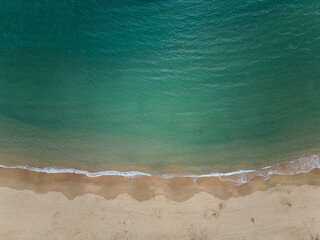 clean sea water and tropical beach, idyllic coast of blue ocean, aerial view
