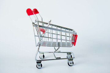 red shopping cart on white background