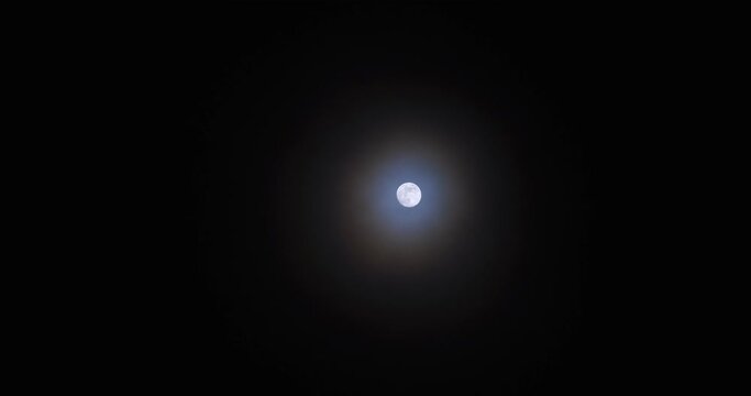 Astrovideography of lunar halo - a circular rainbow forming around the moon, real time shot speed