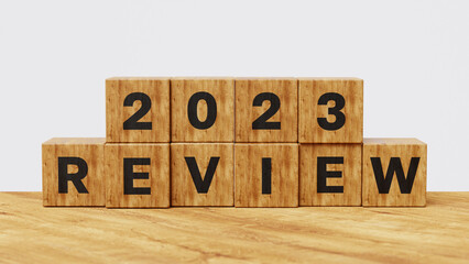 2023 Annual review, business and customer review. Learning, improvement, planning and development concept. 2023 Review on wooden cubes. 3d illustration