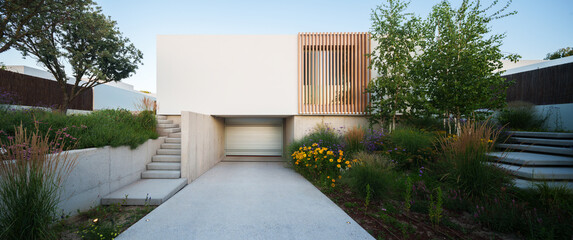 Contemporary sustainable house facade with concrete stairs and landscaped entry path, wooden slats details, and lush greenery in bright daylight