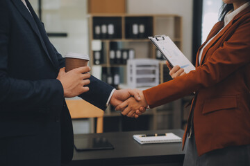 Business handshake for teamwork of business merger and acquisition,successful negotiate,hand...