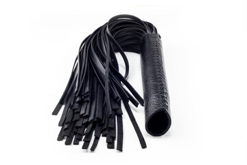 Black flogger on a white background with a stitched handle.