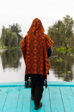 Anonymous persom gazing at Xochimilcos Beauty