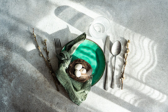 Top view of a Dinner set for Easter holiday evening meal time