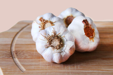 Garlics on the cutting board. Brazilian spices.