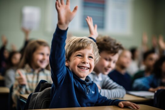 Young boy raising hand in elementary school classroom - Powered by Adobe