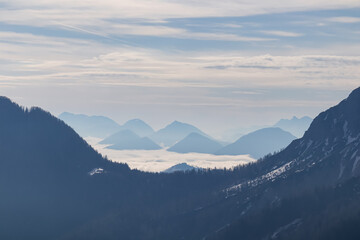 Panoramic view of beautiful Karawanks mountain range in Carinthia, Austria. Magical atmosphere in...