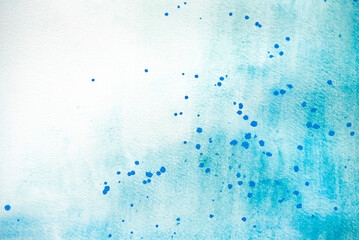 abstrakter Hintergrund in türkis mit blauen Farbspritzern und Sprenkeln, Aquarellfarbe