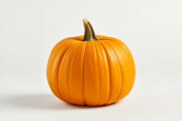 Vibrant pumpkin on clean white background for eye catching advertisements and packaging designs
