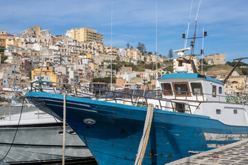 Harbor with fishing boats and city Sciacca, Sicily - obrazy, fototapety, plakaty