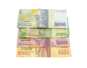 There are four stacks of indonesian rupiah paper currency