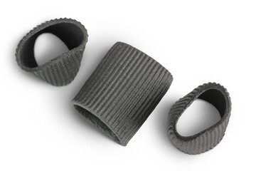 Black pasta with cuttlefish ink isolated on white background. Top view. Flat lay.