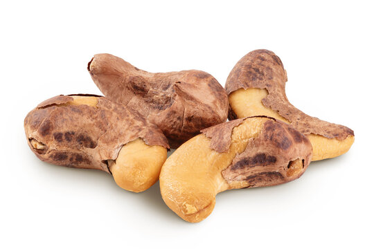 cashew nuts heap with shell isolated on white background
