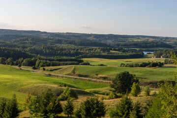 View of a beautiful landscape of green nature, fields and forests, the green lungs of Poland