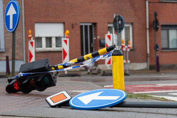 Accident on the street and broken traffic lights, damaged traffic lights by storm