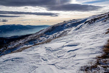 Scenic view of snow covered alpine meadow on hiking trail between Gertrusk and Ladinger Spitz,...